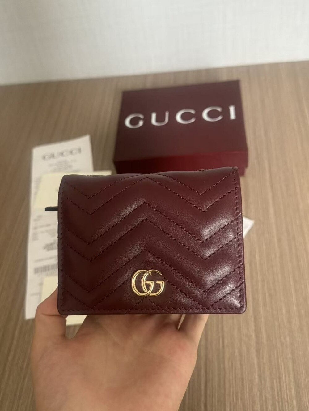 Gucci Quilted Burgundy Leather Compact Wallet with Gold GG - Picture 1 of 7